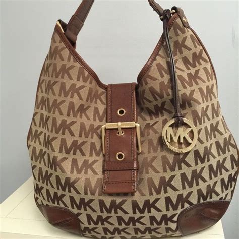 michael kors ludlow large shoulder bag mk monogram|Michael Kors Black and Tan Monogram Ludlow Shoulder Bag.